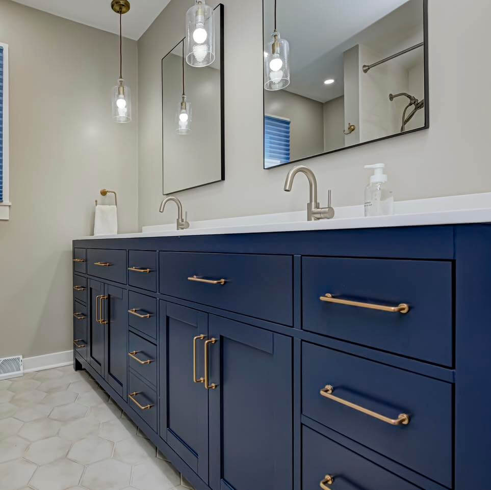 Choose a Deep Navy Vanity with Warm Brass Hardware