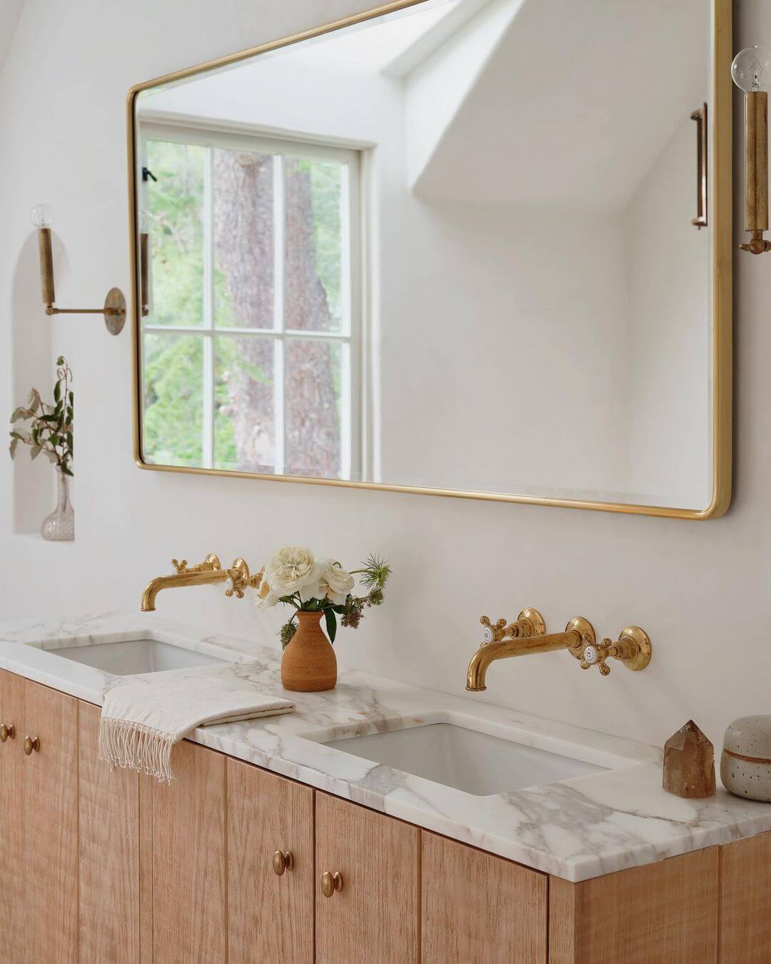 Contrast Warm Wood with Cool Marble and Brass