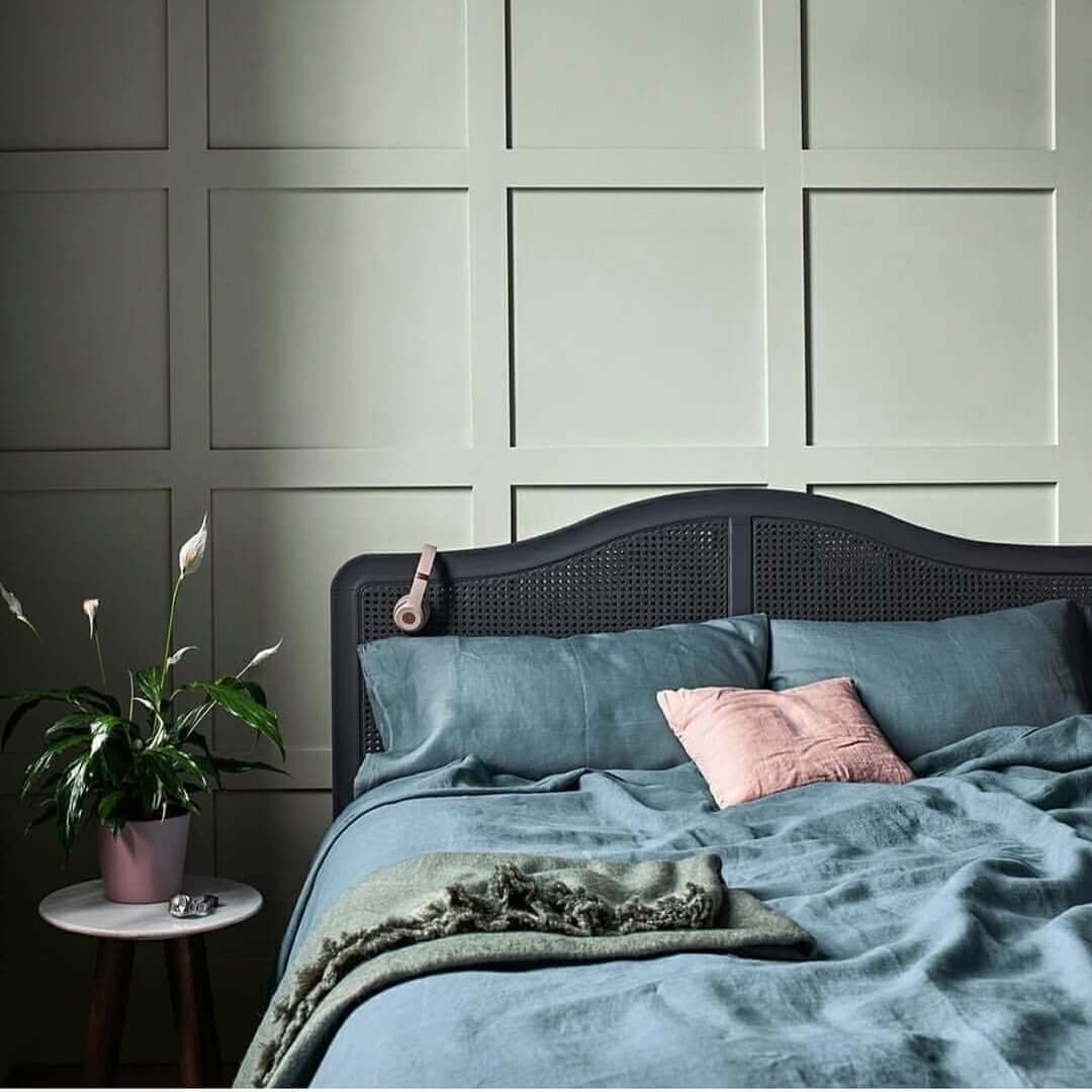 Paneled Walls Create a Calm Sage Green Backdrop