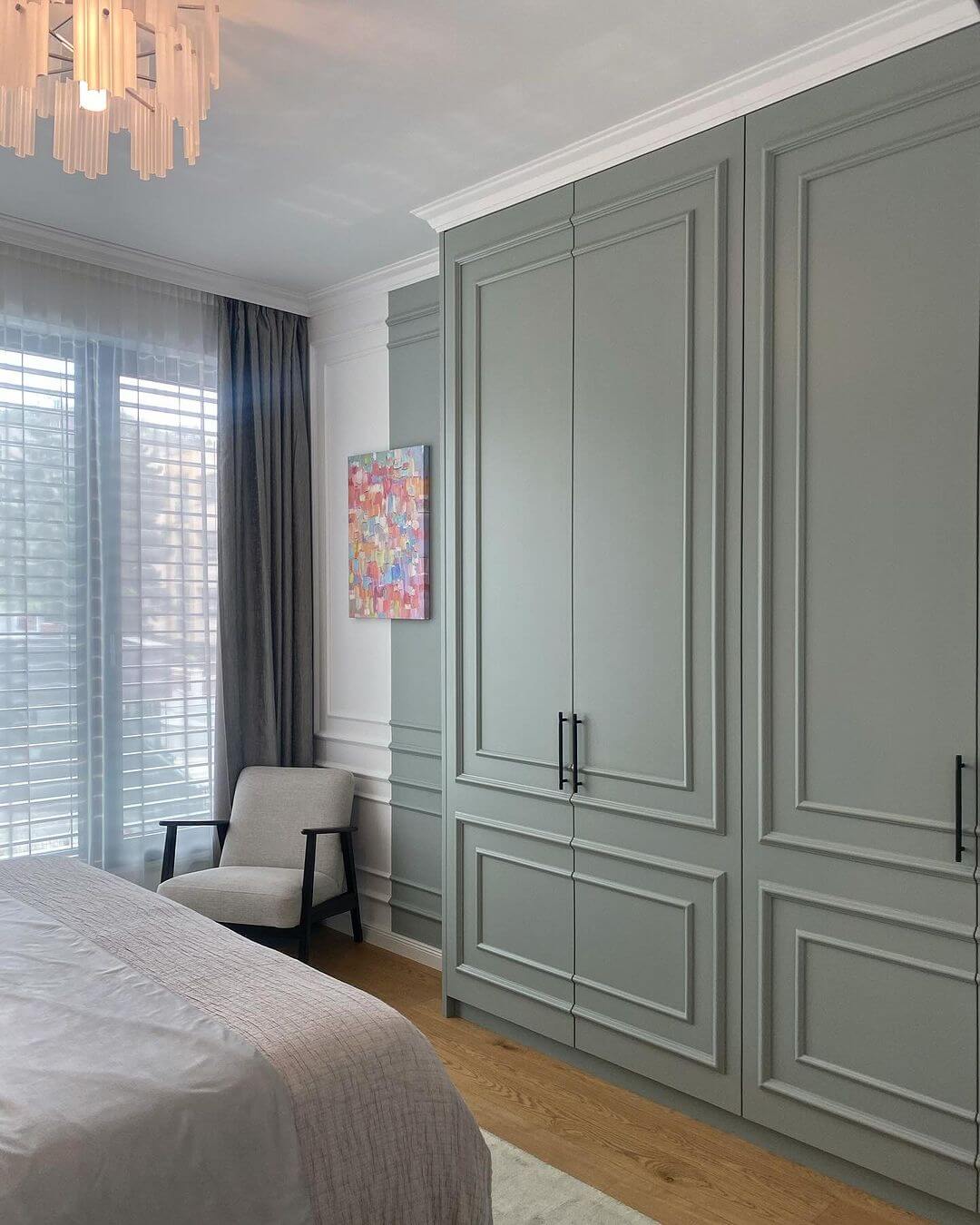 Incorporate Storage with Sage Green Built-In Wardrobes