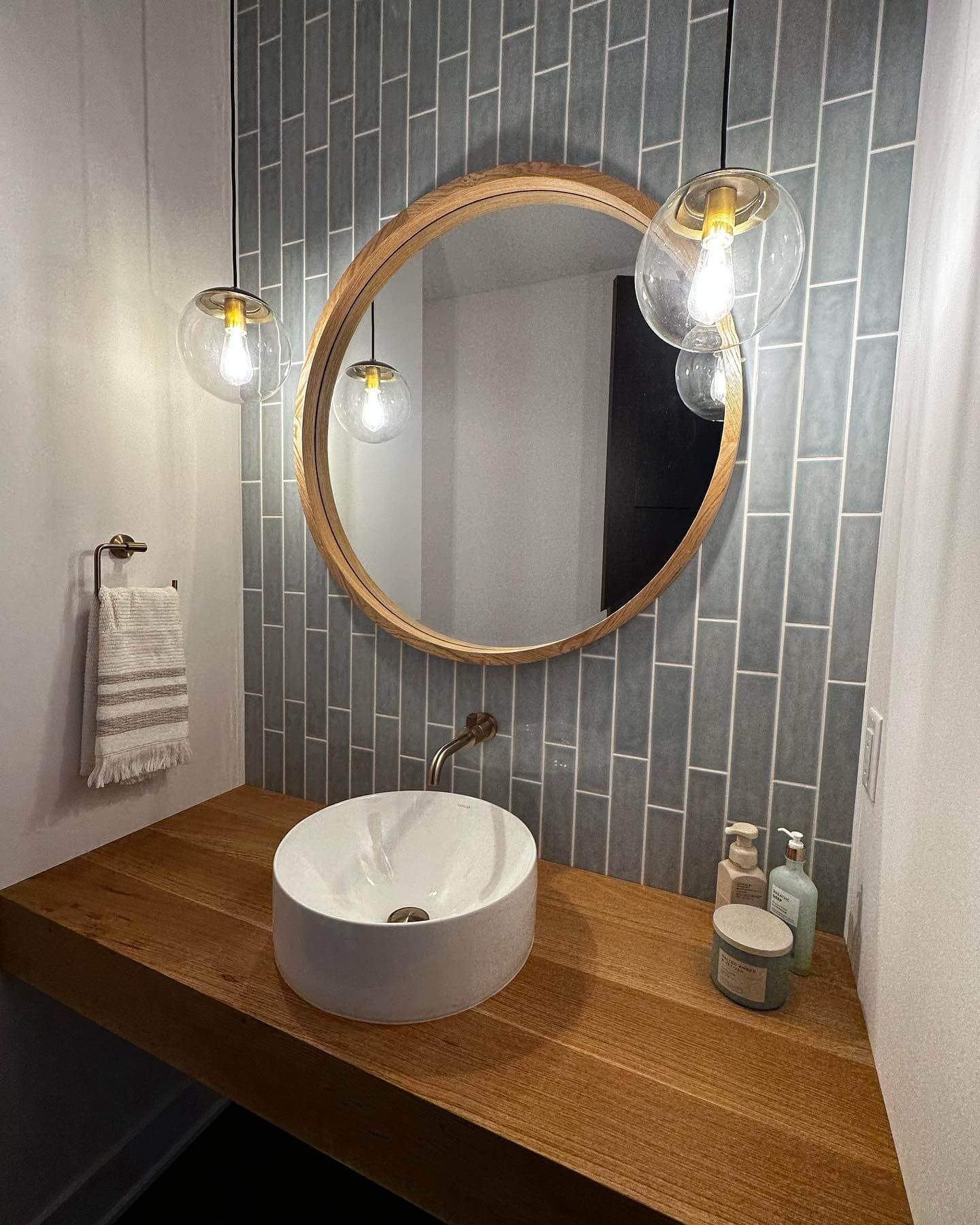Wooden Countertop With Vessel Sink Creates a Spa-Like Feel