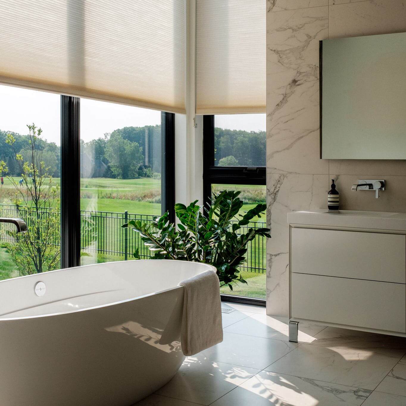 Cream Honeycomb Shades Offer Gentle Light Diffusion