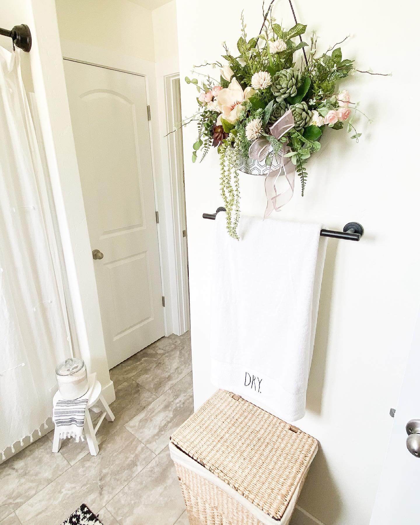 Hanging Floral Arrangement Adds Soft Texture Above Towel Bar