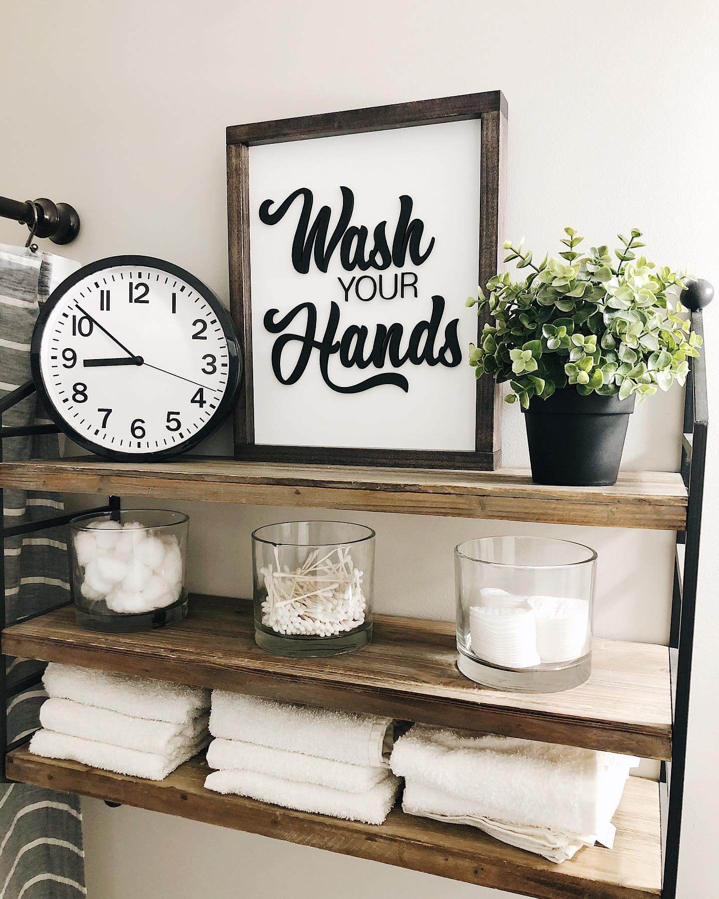 Wooden Shelves Display Glass Jars of Bathroom Essentials