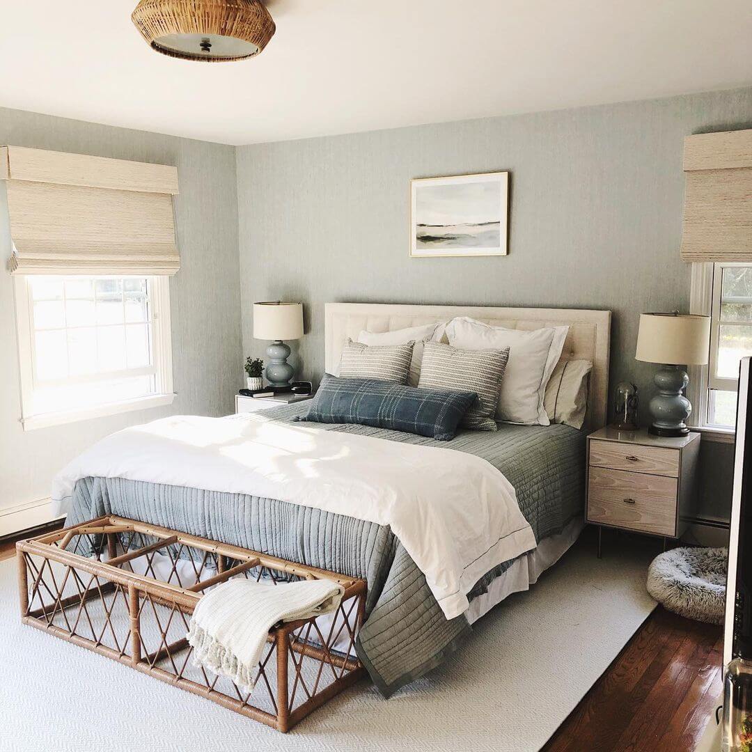 Rattan Bench With Open Weave Adds Natural Texture At Foot Of Bed