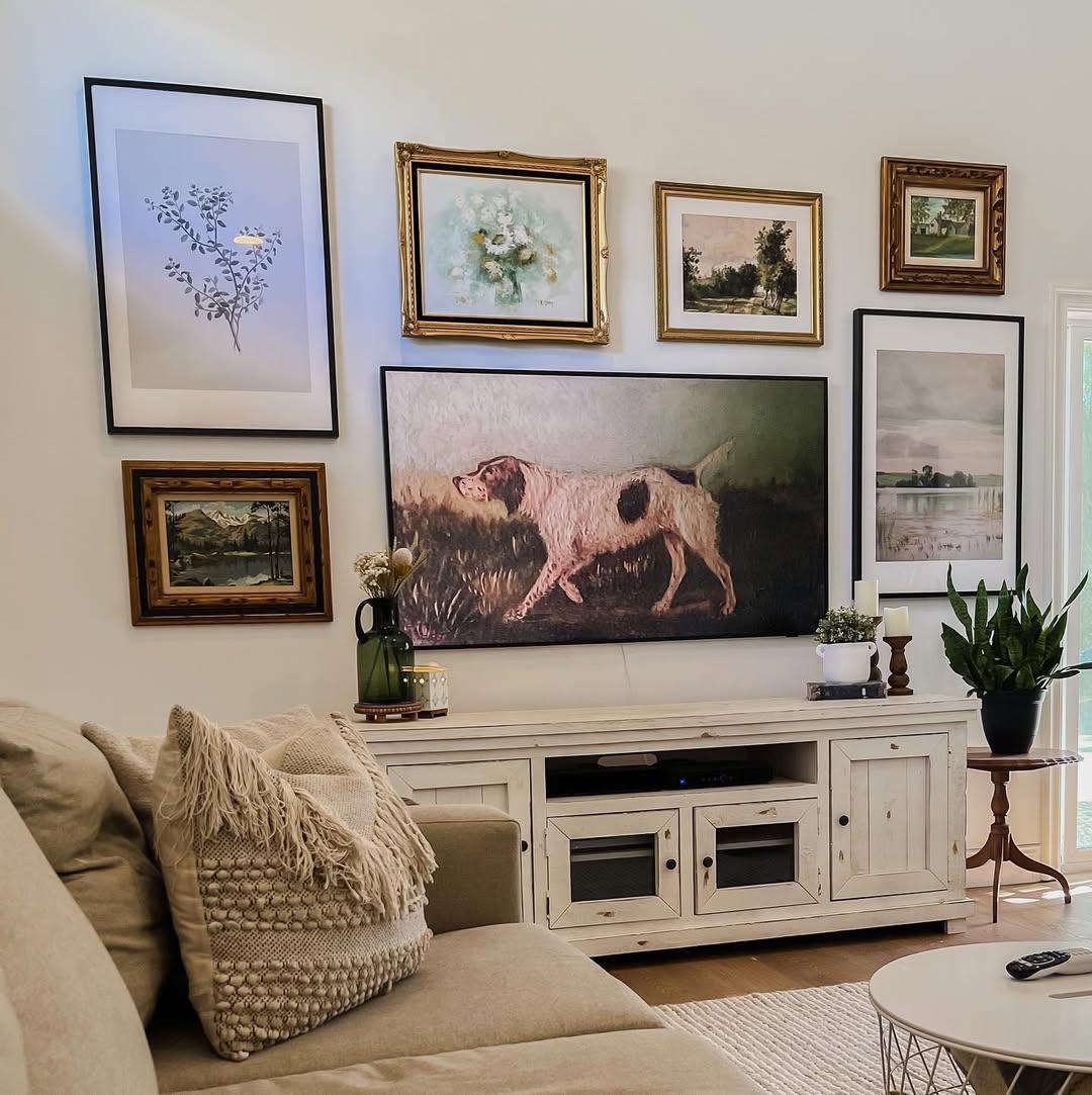 Mix Vintage Art With Your TV For A Layered Gallery Wall
