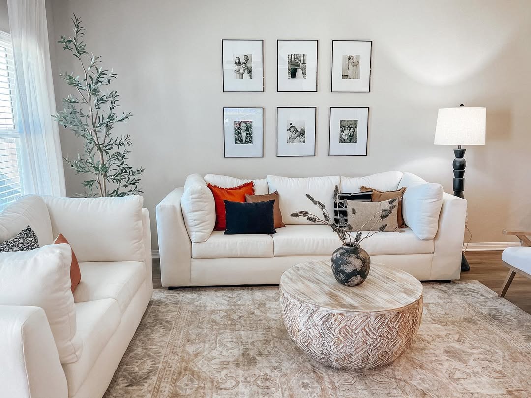 Group Black-Framed Photos In A Grid For A Balanced Gallery Wall
