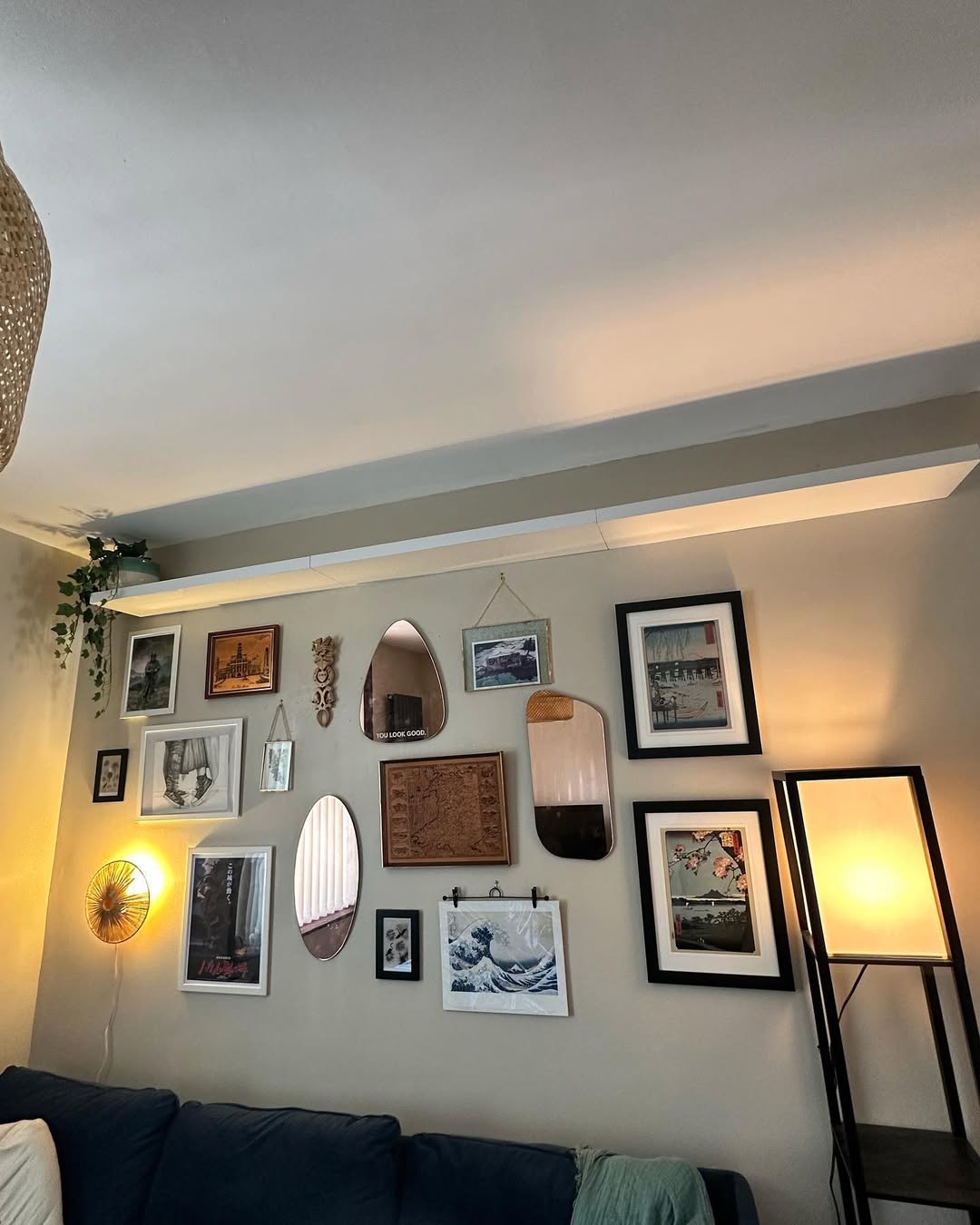 Mix Round and Oval Mirrors with Artwork