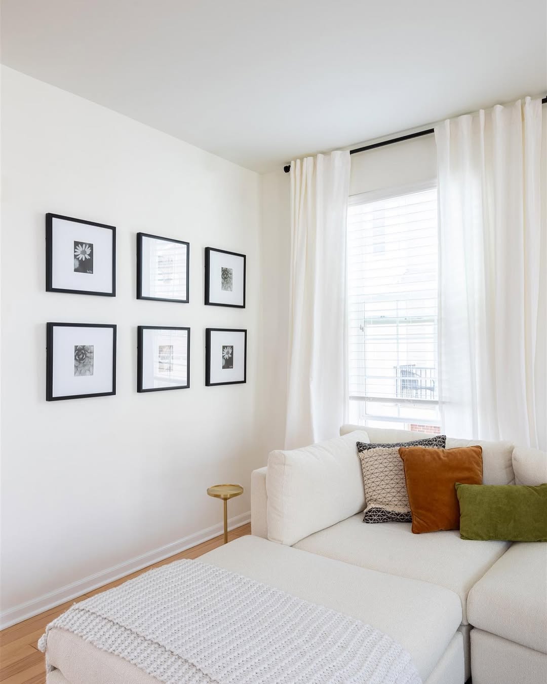 Group Identical Floral Prints for a Symmetrical Gallery Wall