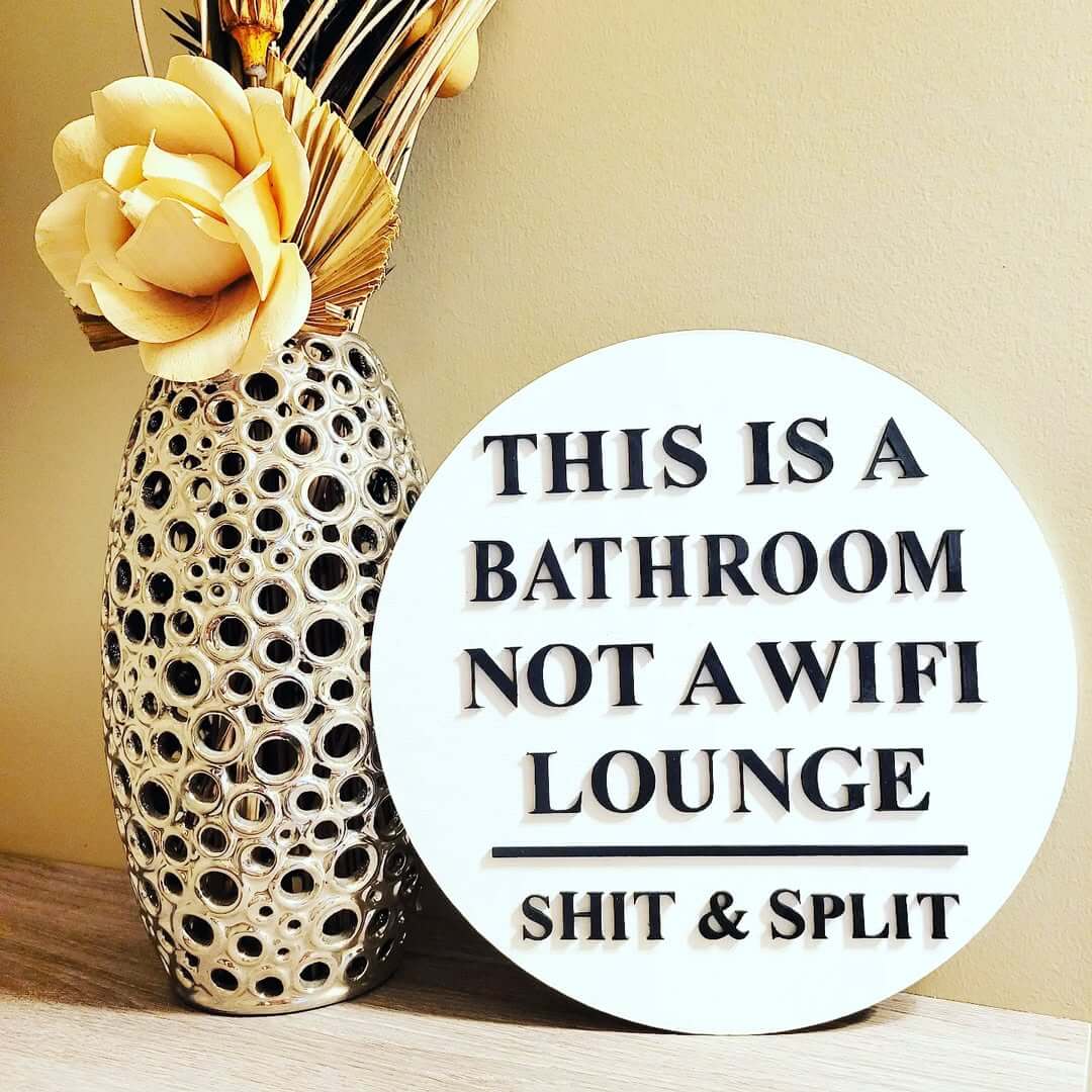 Round Sign Encouraging Swift Bathroom Visits
