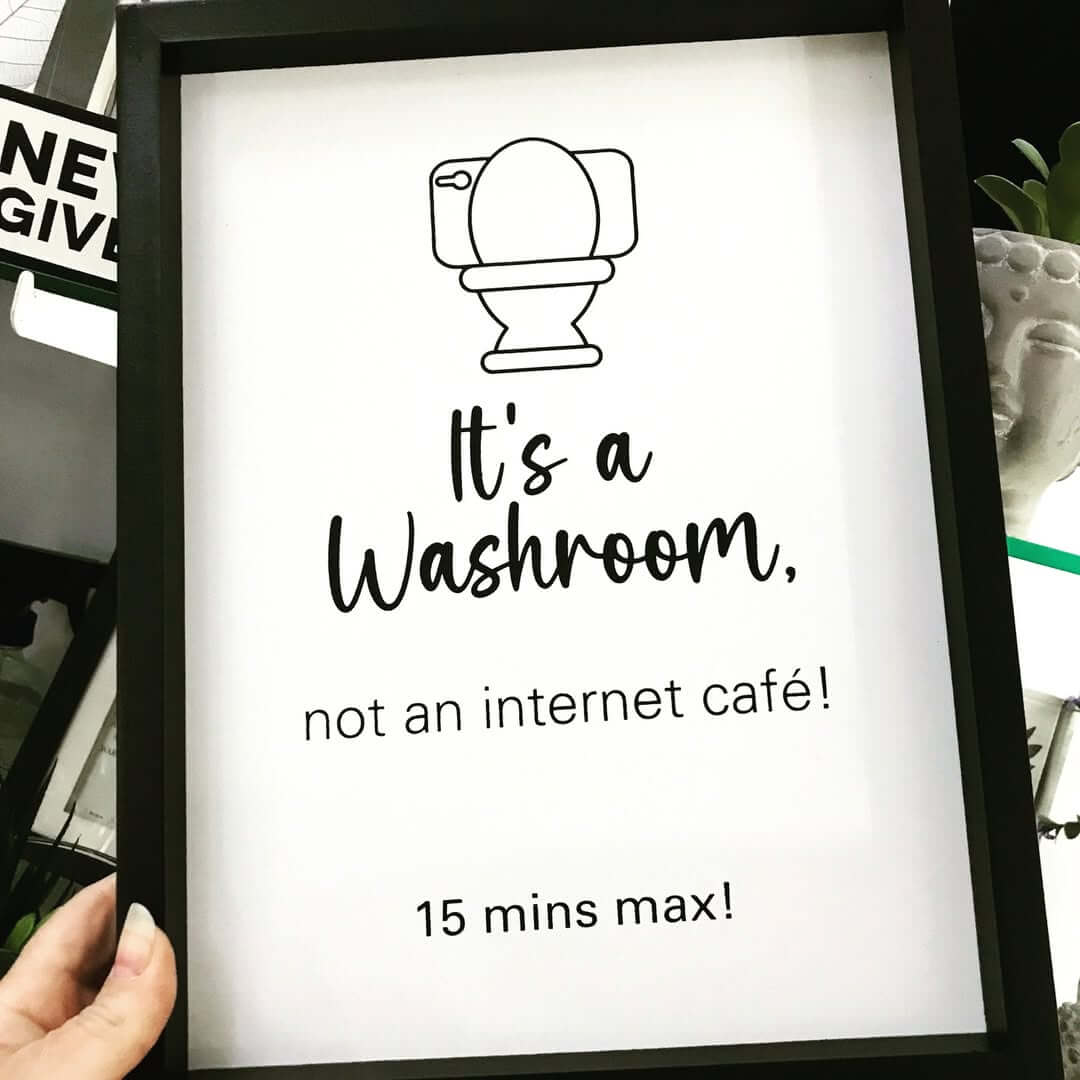 Framed Sign Sets Time Limits for Bathroom Use