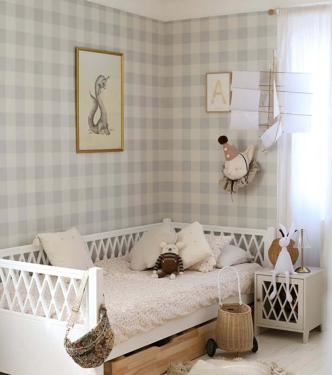 Gentle Gingham Walls Create a Soft Nursery Backdrop