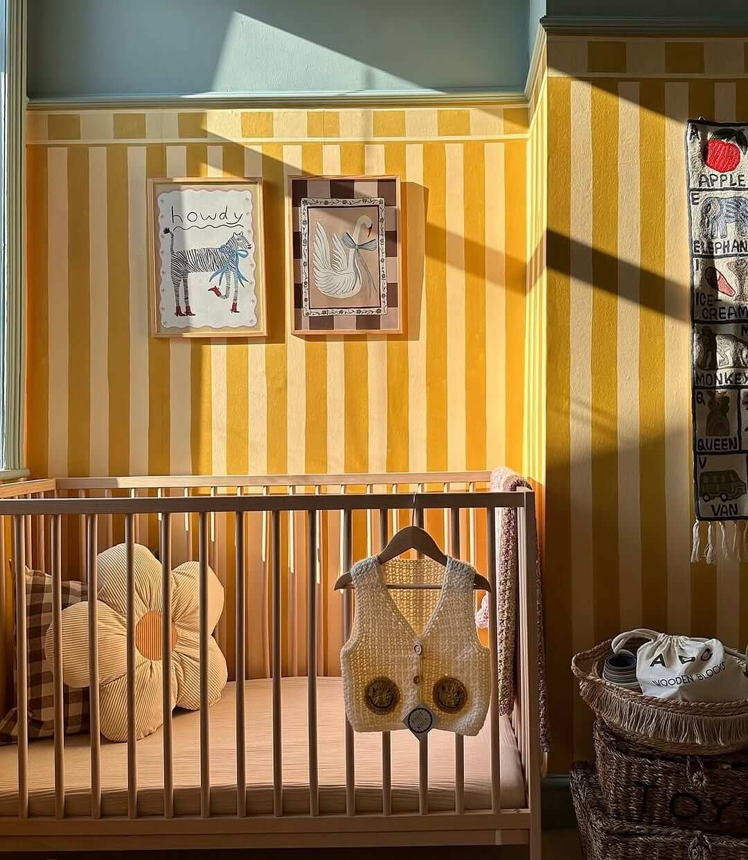 Striped Yellow Walls Create a Sunny Nursery Backdrop