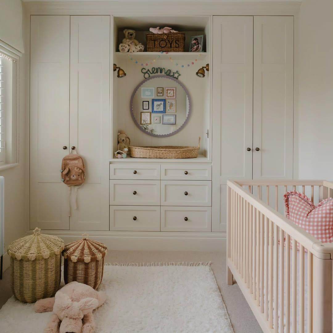 Design a Circular Gallery Wall Above a Woven Bassinet