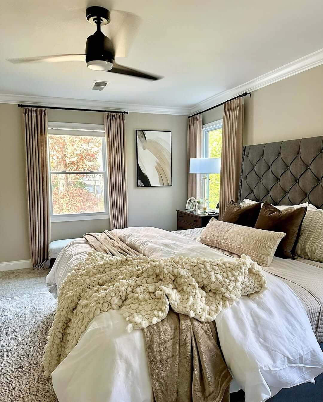 Deeply Tufted Headboard Creates a Cozy, Inviting Bedroom Focal Point