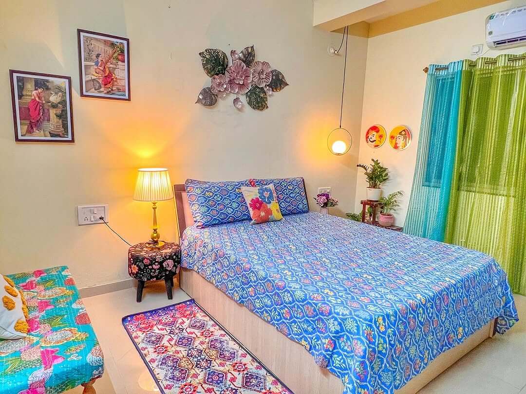 Textured Wall Art Adds Floral Dimension Above the Bed