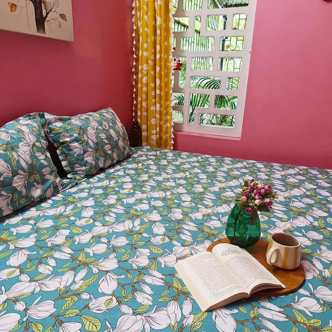 Teal Magnolia Print Bedding Adds a Bold Botanical Touch