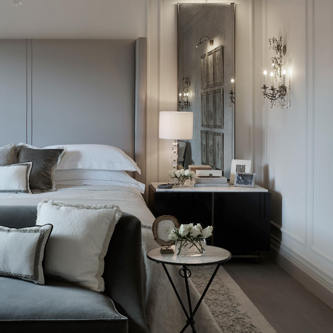 Distressed Full-Length Mirror Adds Vintage Charm Above Nightstand