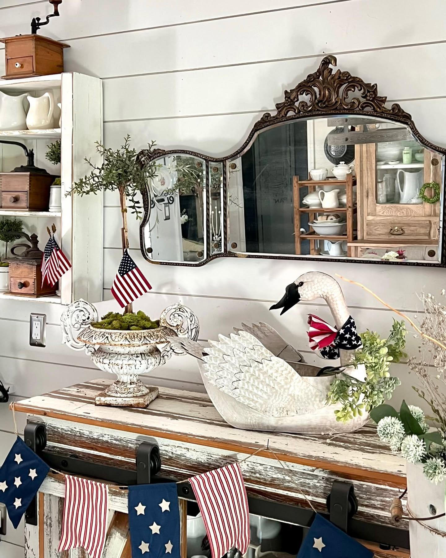 Frame a Cabinet Display with an Ornate Tri-Panel Mirror