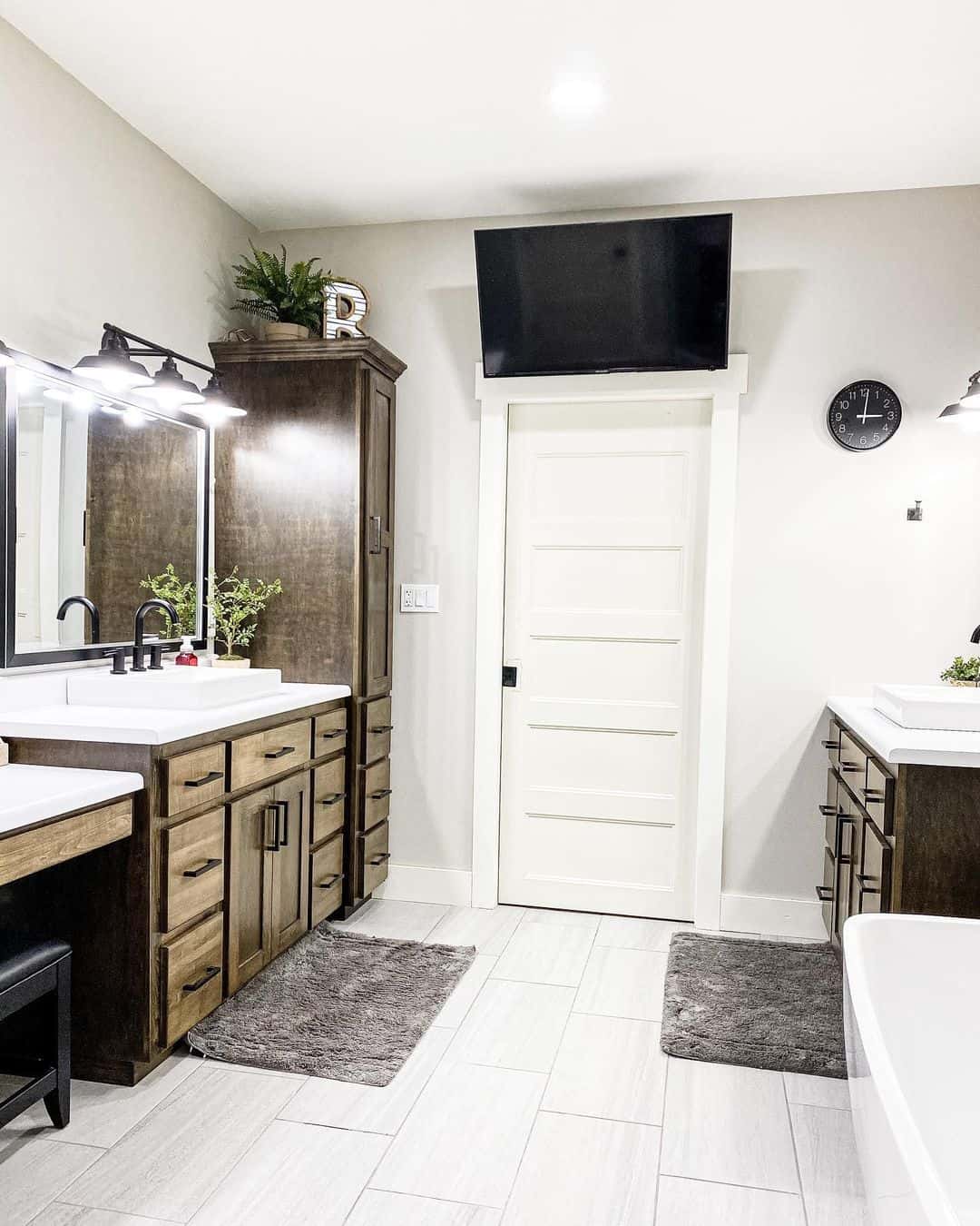 Tall Linen Cabinet Adds Vertical Interest Above the Vanity