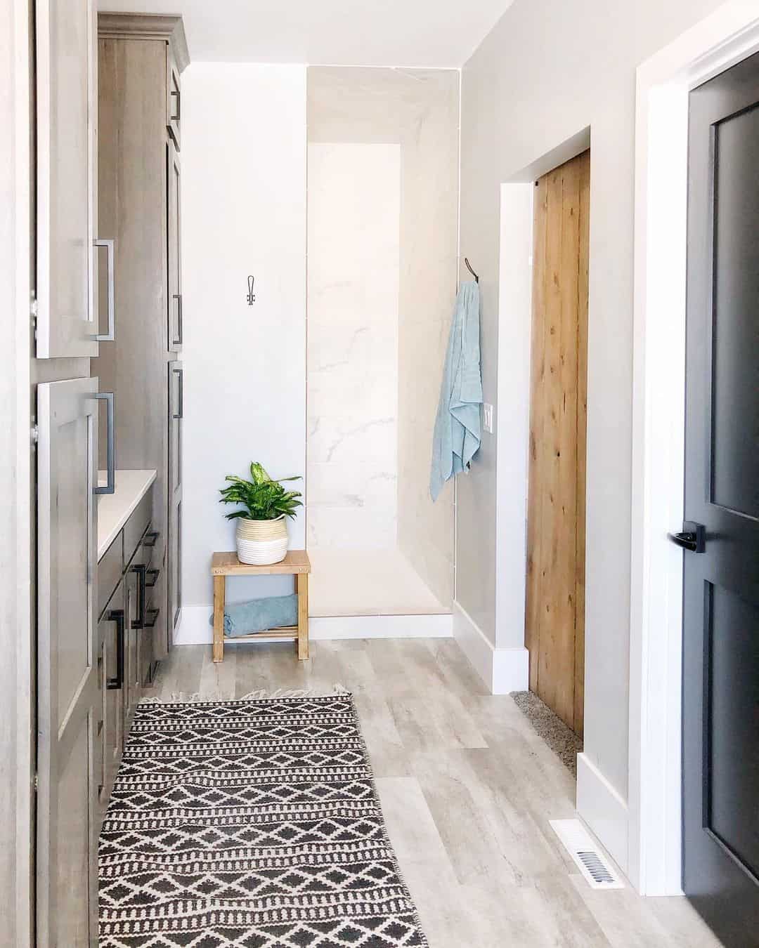 White Baseboards Frame a Rustic Wood Door