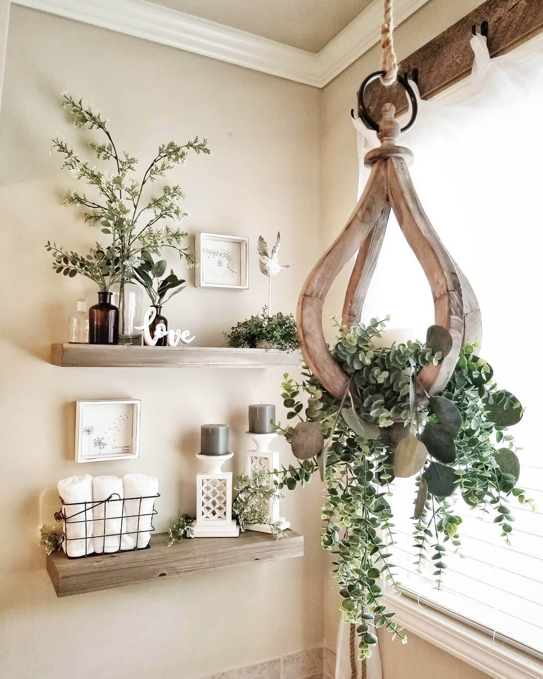 Hanging Wooden Candle Holder Draped With Cascading Greenery