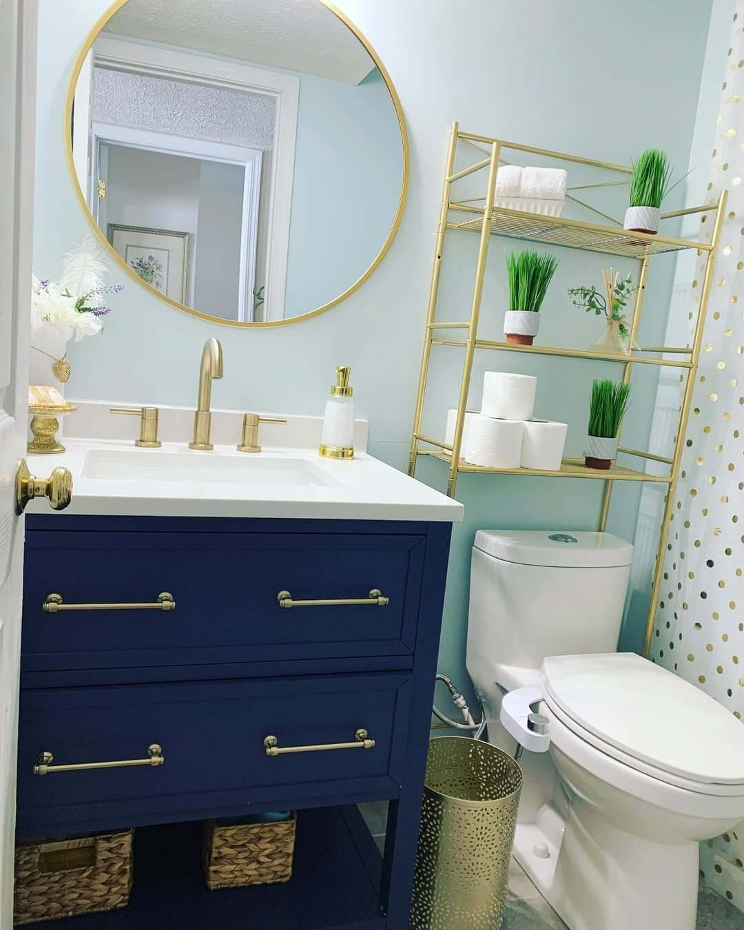 Slim Gold Ladder Shelf Adds Vertical Storage Next to Toilet