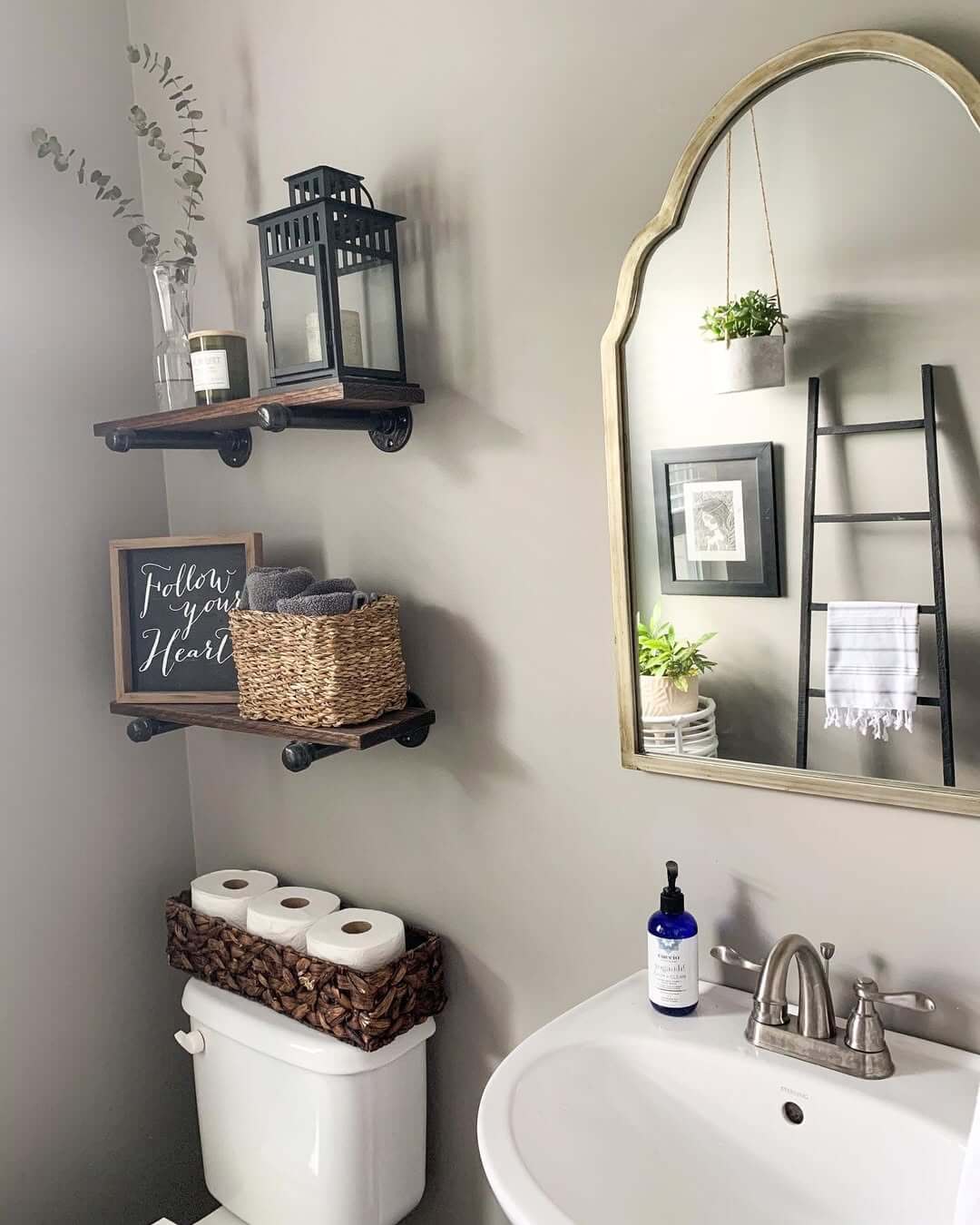 Woven Basket Holds Toilet Paper Rolls on Tank