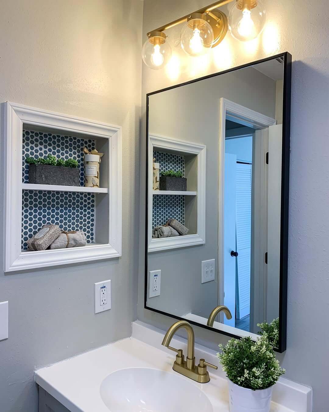 Built-in Niches With Penny Tile Add Patterned Backdrops