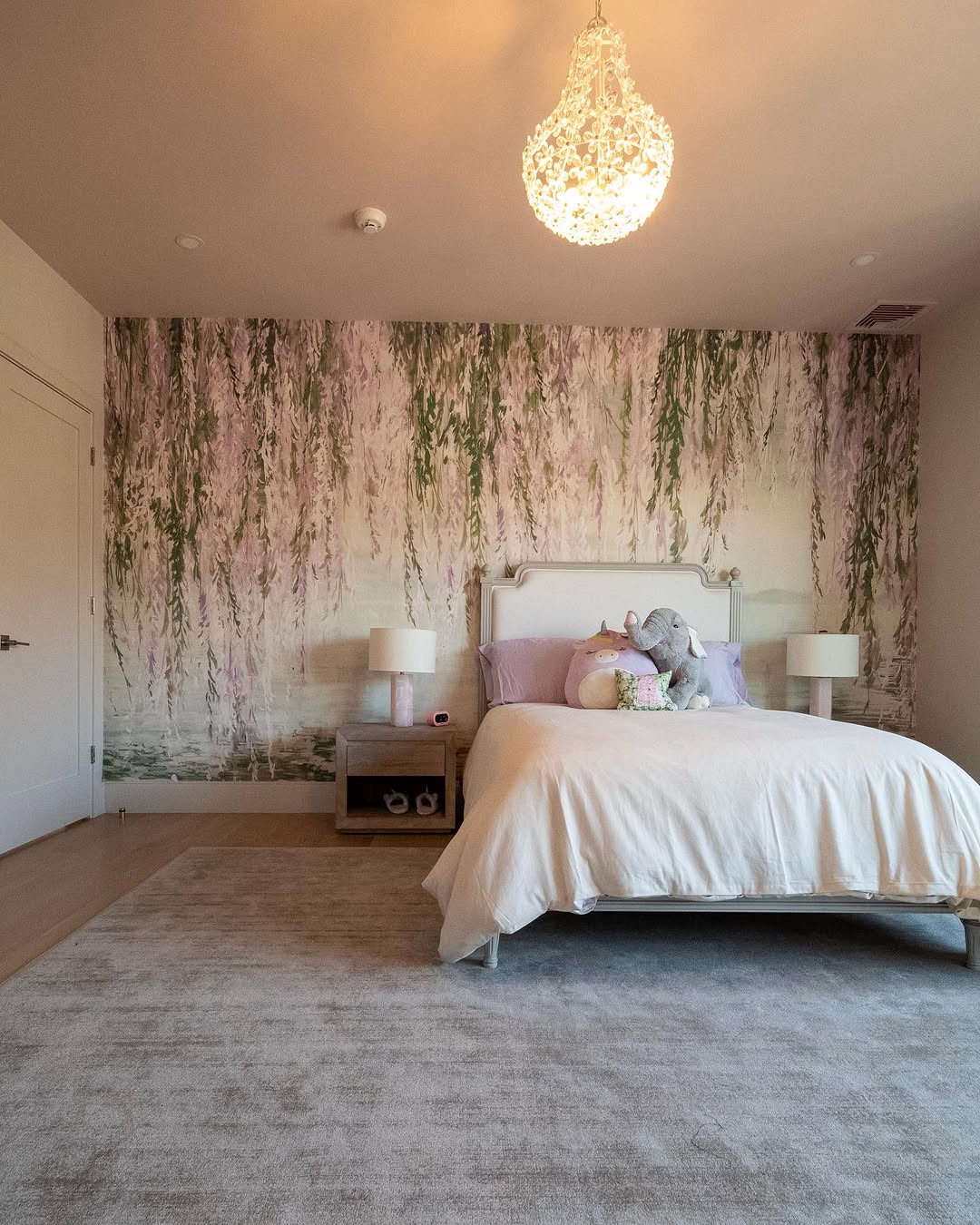 Soft Gray Rug Understated Against a Dramatic Floral Wall