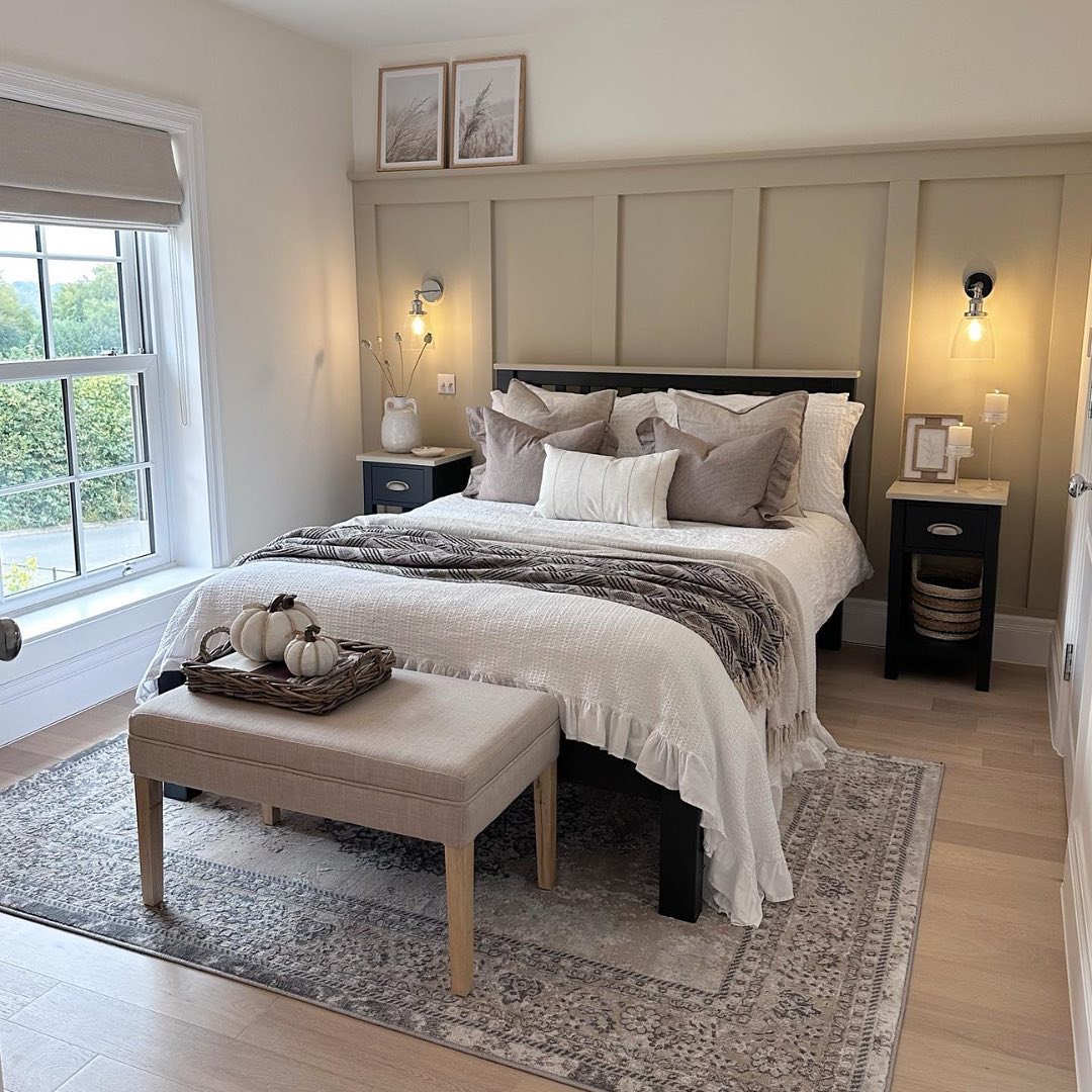 Distressed Gray Rug Adds a Layered Vintage Feel to Bedroom