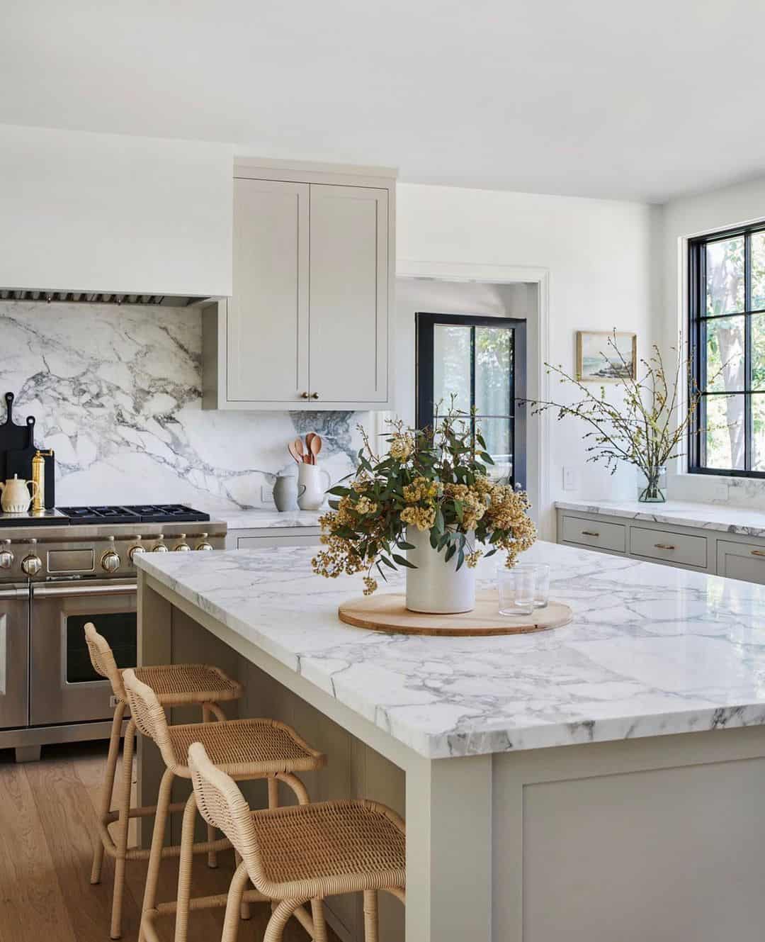 Beige Kitchen Cabinets Paired with Subtle Grey Marble Countertops