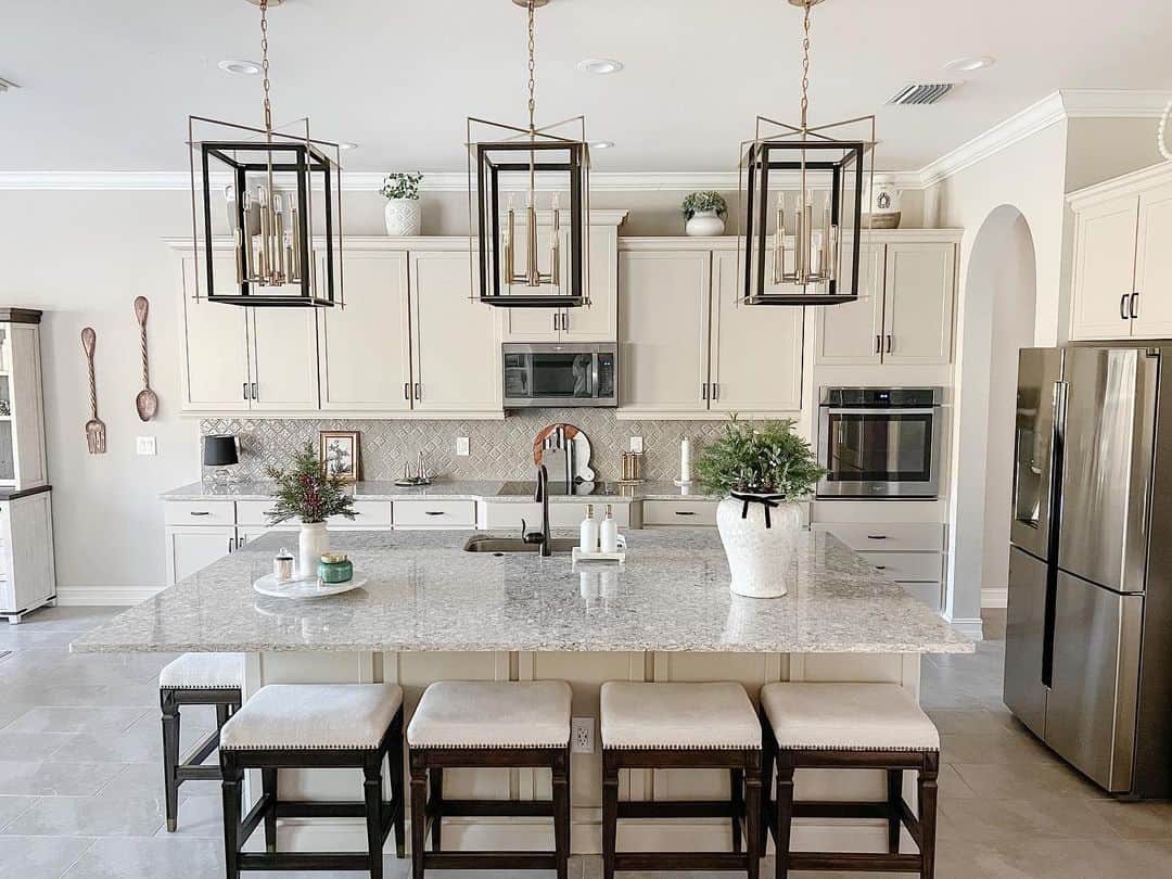 Geometric Lantern Pendants Add Architectural Interest Above Island
