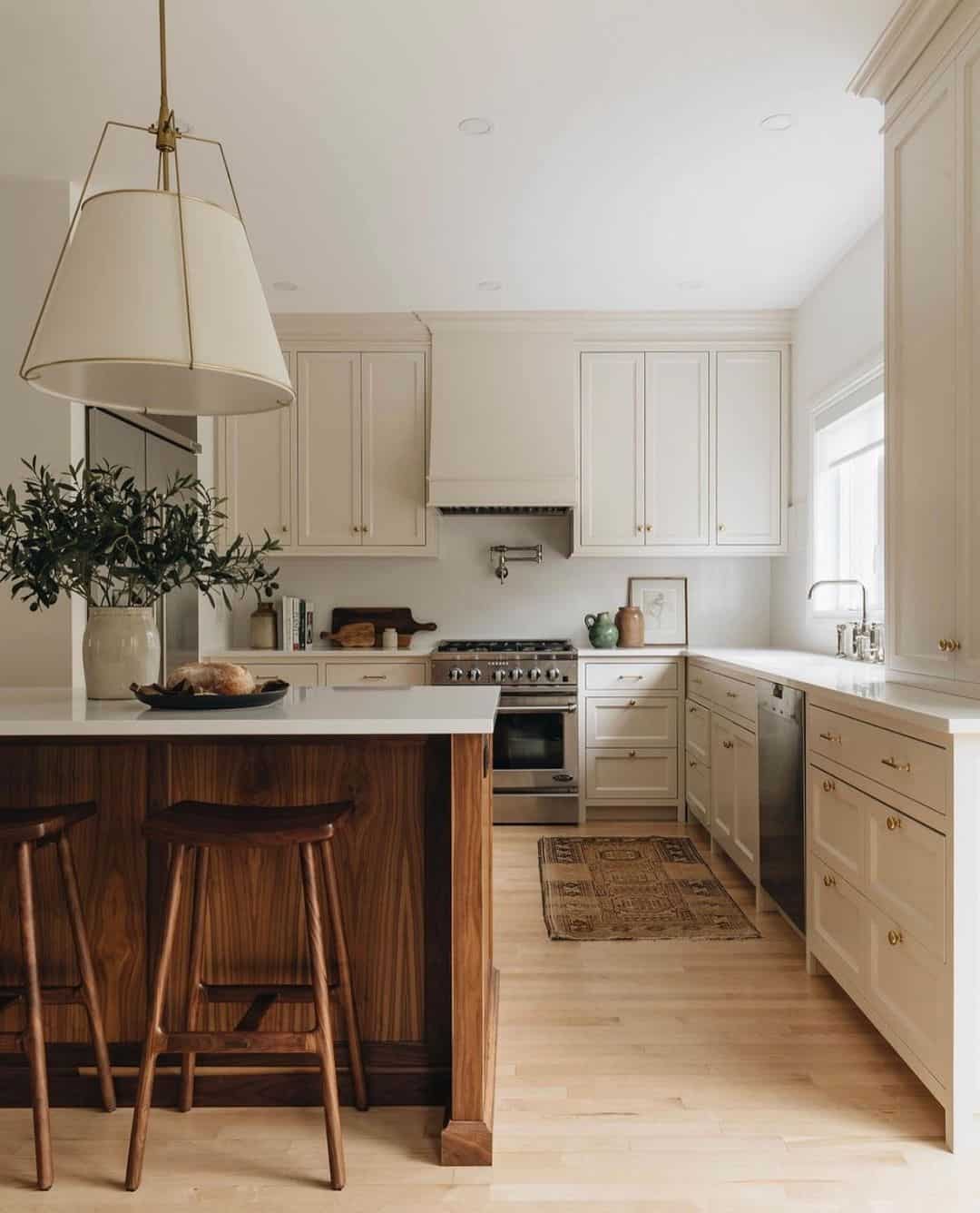 Warm Wood Island Contrasts with Beige Cabinetry