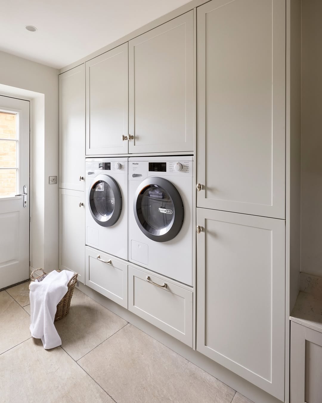 Integrated Drawers Offer Discreet Storage Below Laundry Machines