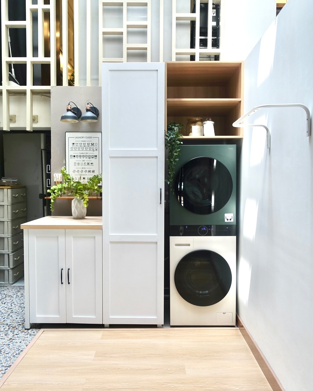 Stacked Green and Cream Laundry Machines Add a Bold Color Statement