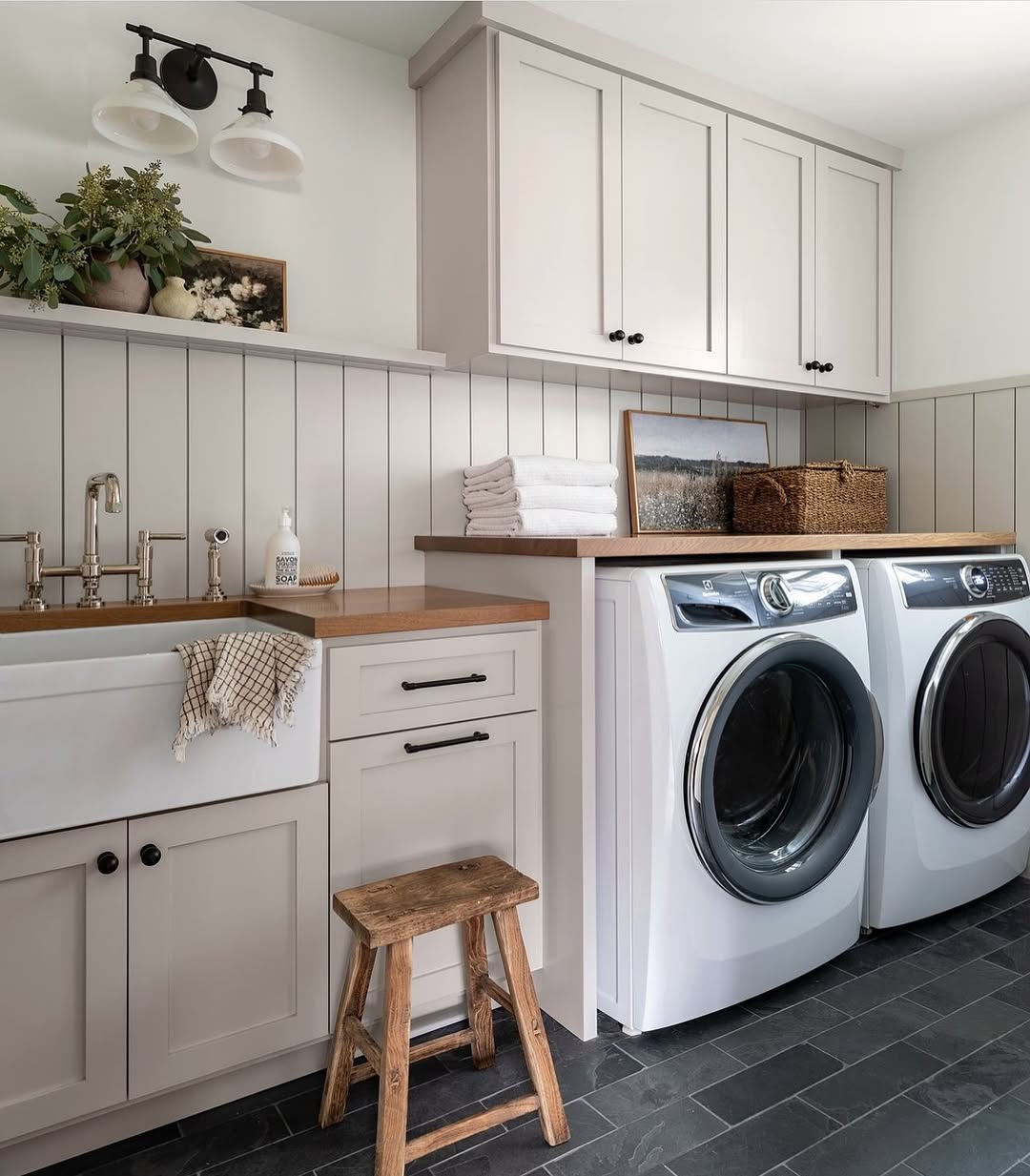Wooden Stool Adds Rustic Charm to Laundry Room Vanity