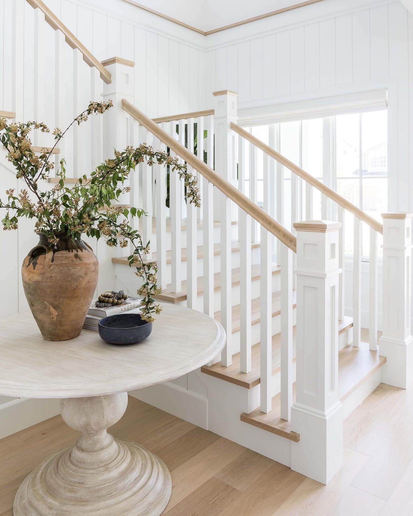 Weathered Pedestal Table with Earthy, Organic Accents