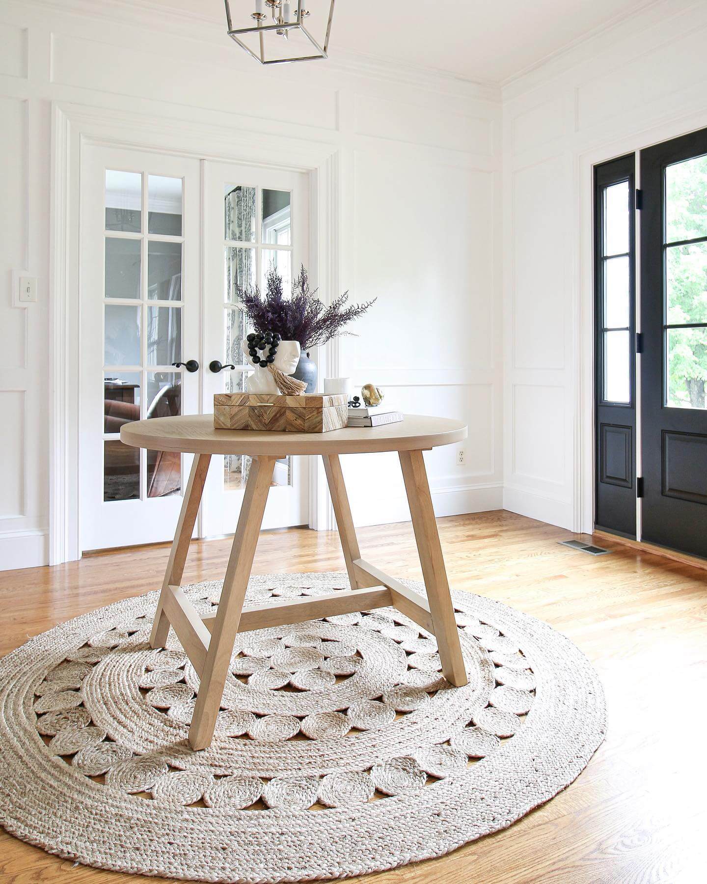 Warm Entryway with Light Wood Table and Jute Rug