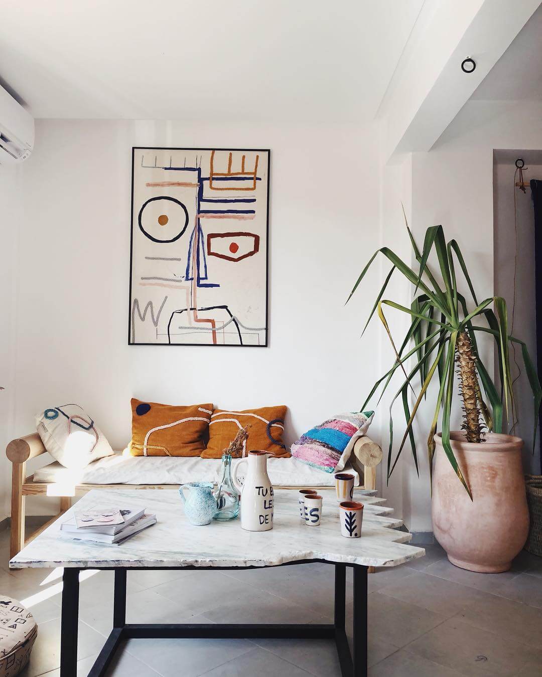 Anchor a Boho Space With Abstract Face Artwork