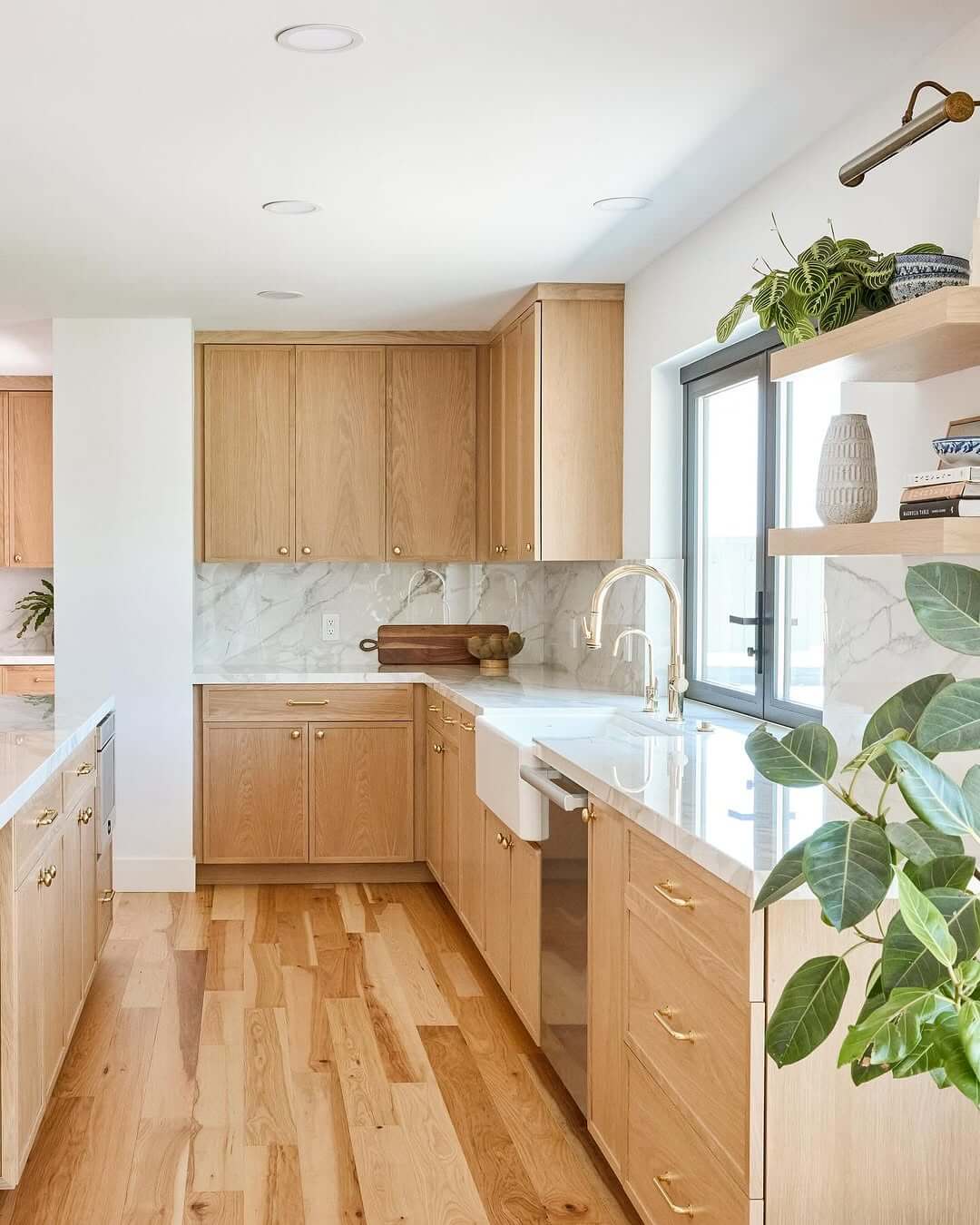 Brass Drawer Pulls Accentuate Warm White Oak Cabinetry