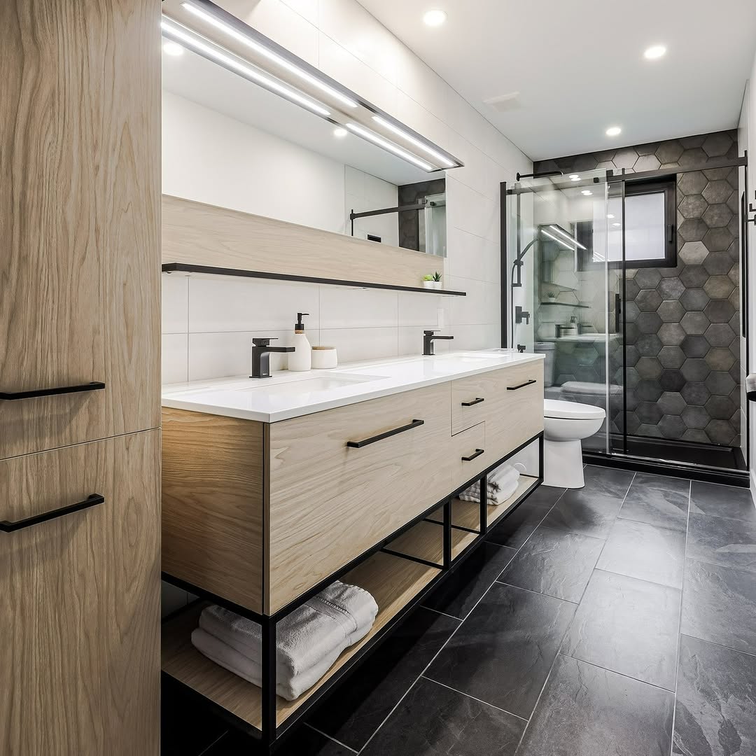 Hexagonal Black Tiles Create a Dramatic Shower Accent