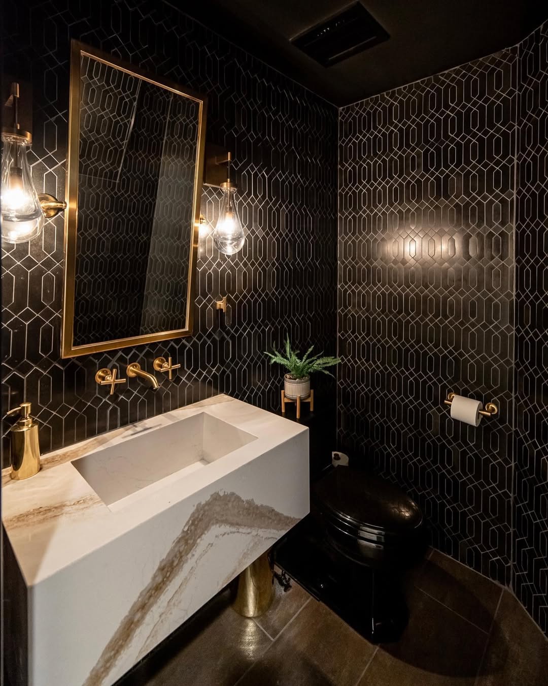 Geometric Black Tile Walls Create a Striking, Modern Pattern