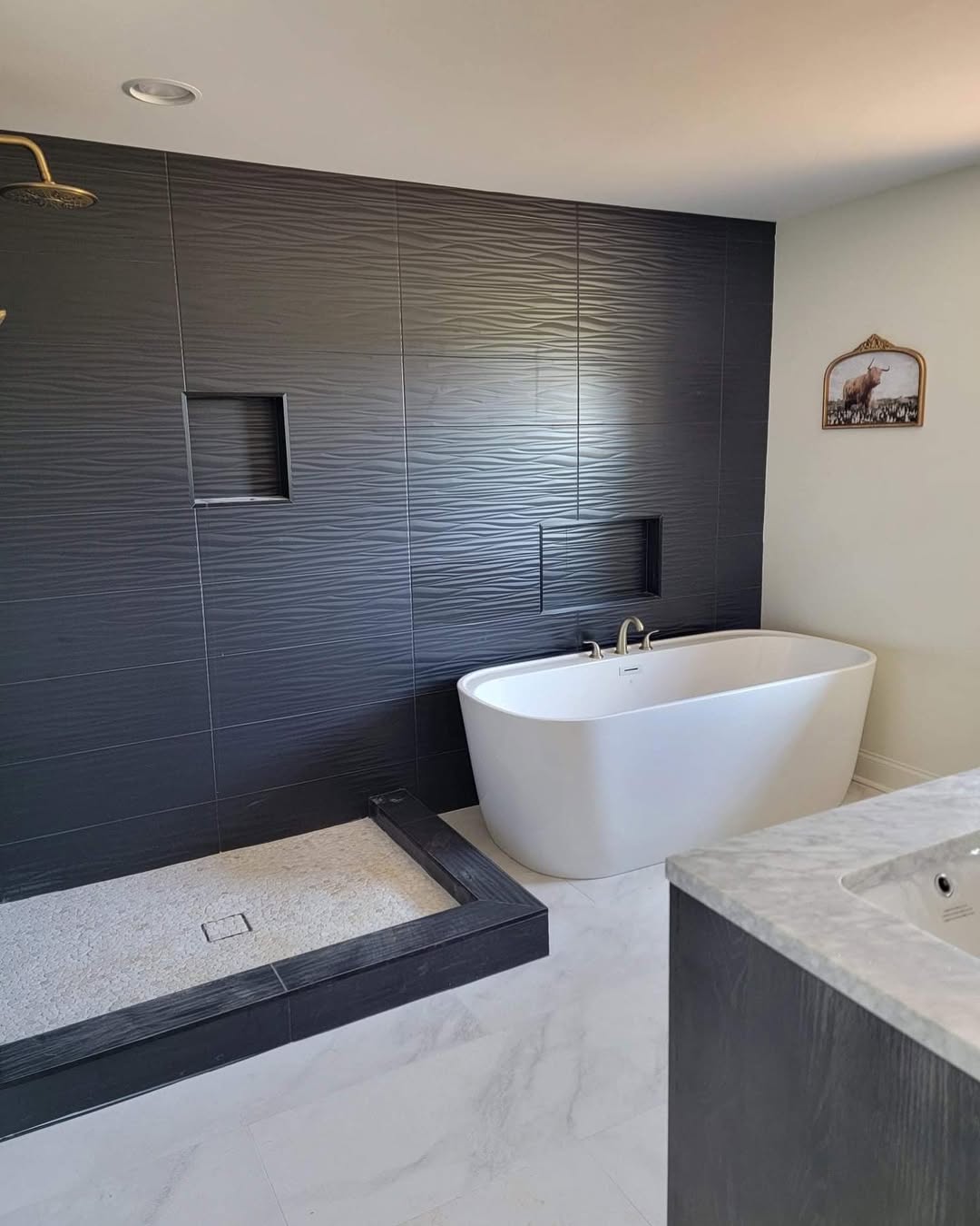 Textured Black Tiles Create a Rippled, Modern Backdrop