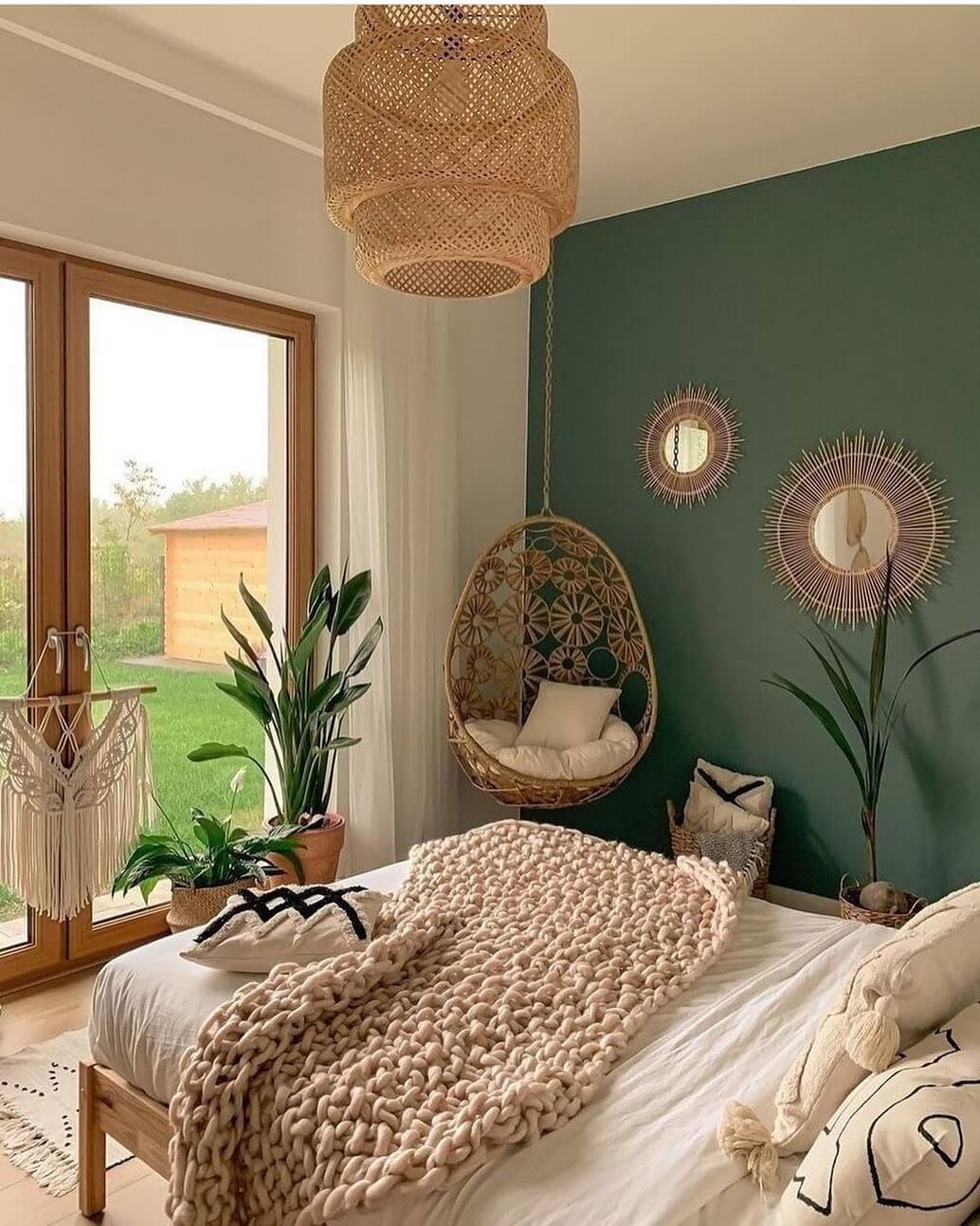 Sunburst Mirrors for Whimsical Texture on Green Walls