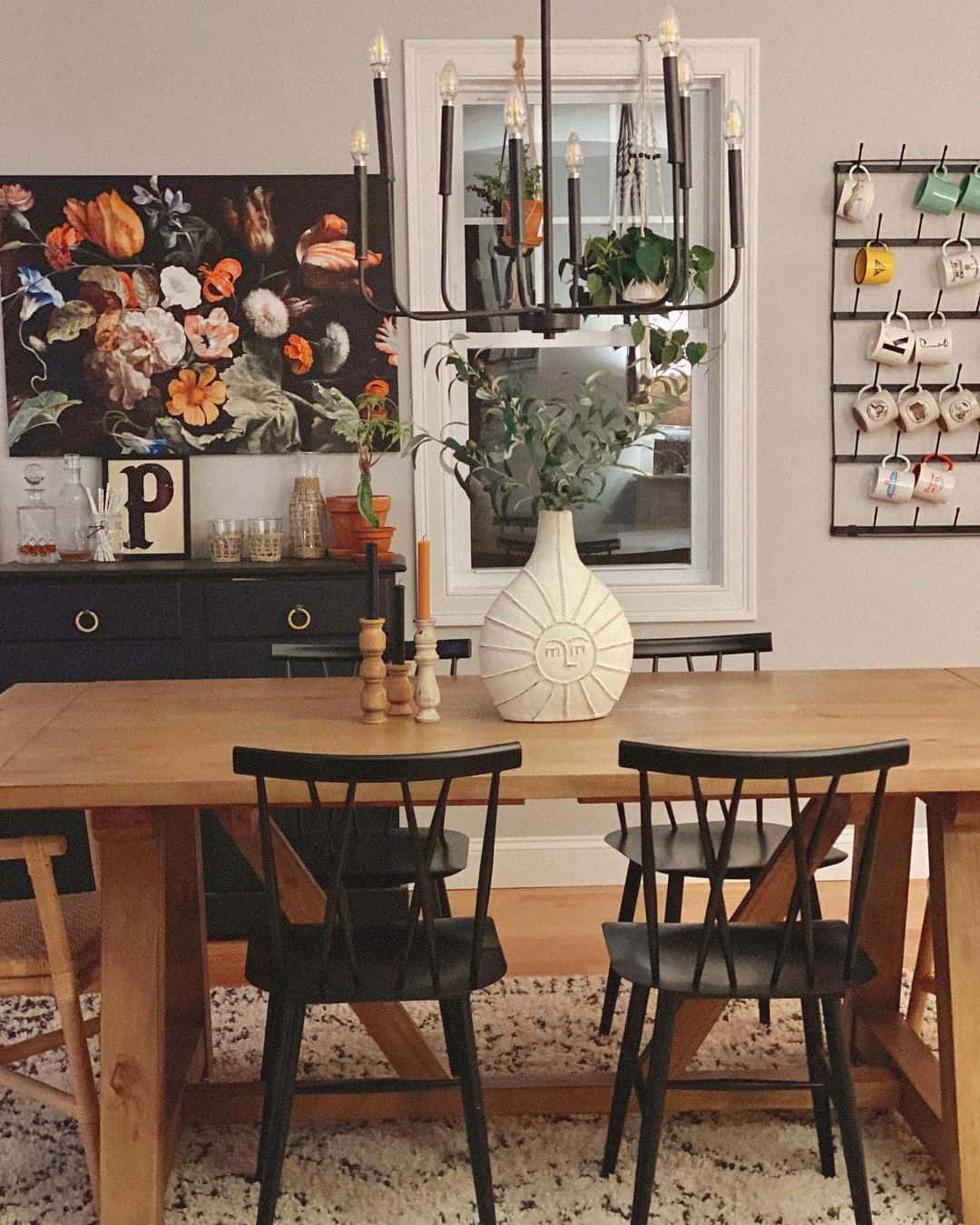 Dark Floral Artwork Adds Moody Drama Above a Buffet