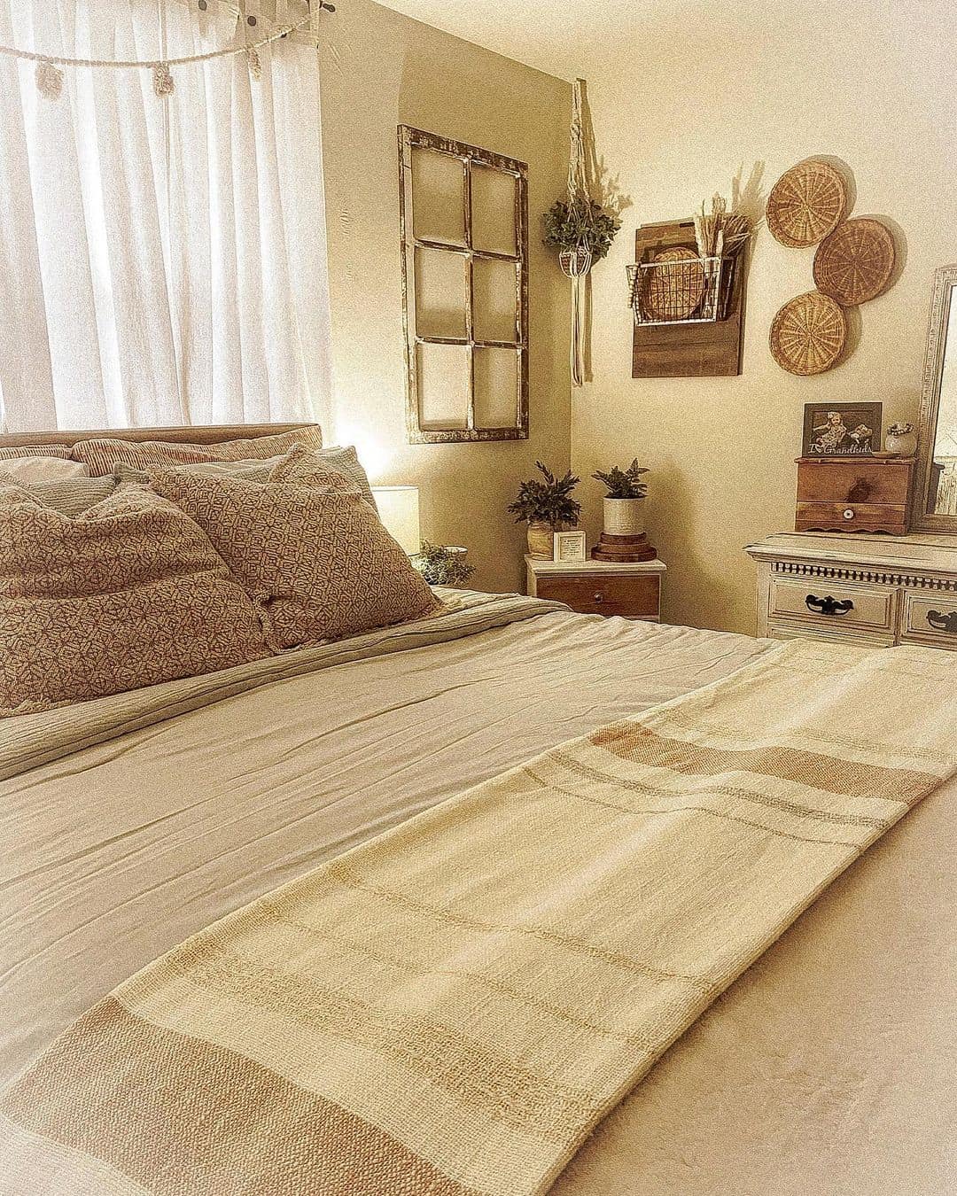 Wooden Window Frame Adds Rustic Charm Above the Bed