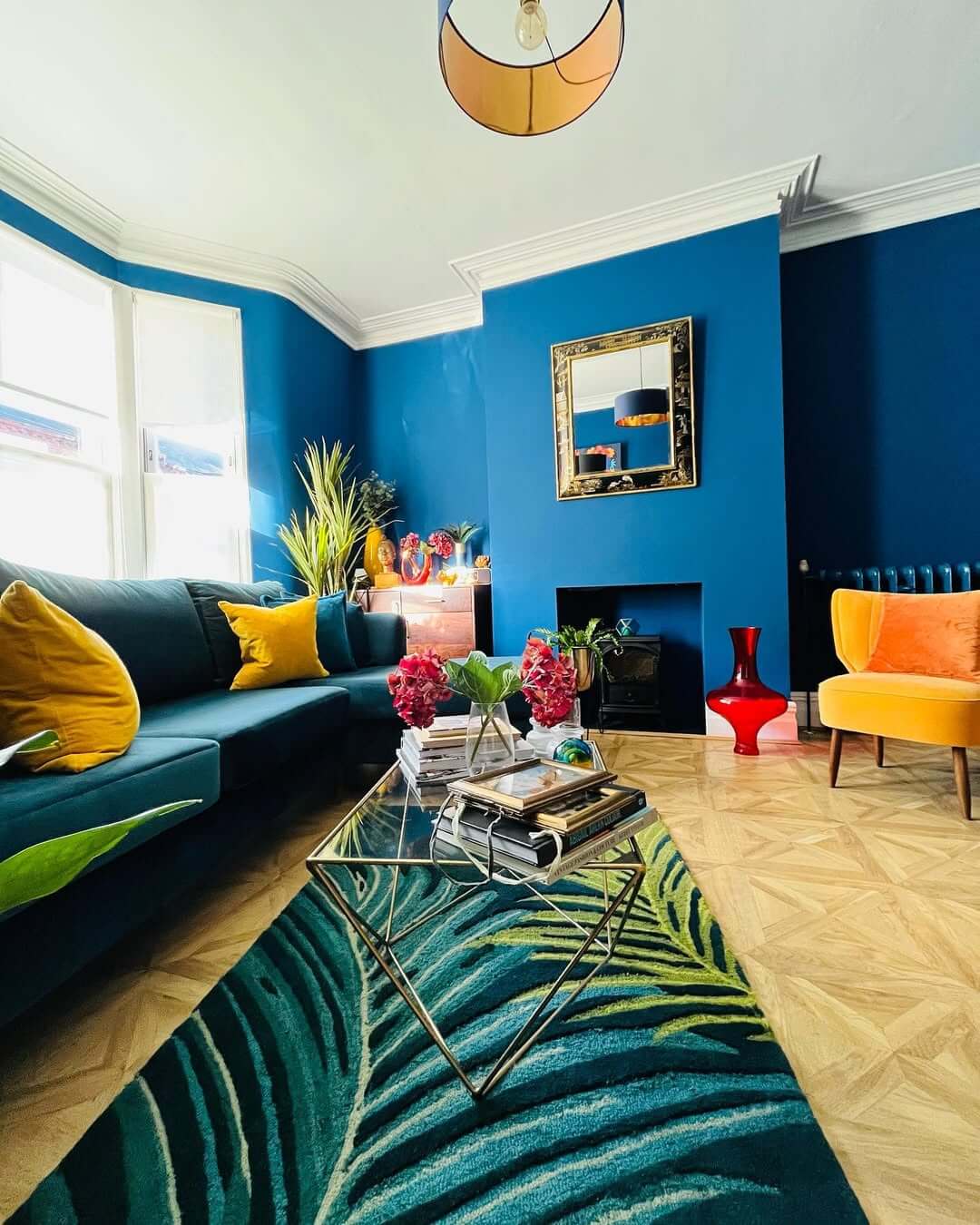 Contrast a Geometric Coffee Table with a Leaf Rug