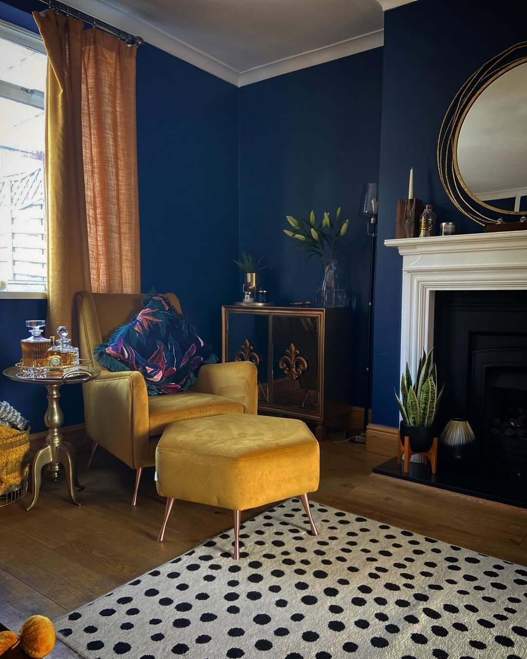 Velvet Ottoman With Copper Legs Adds A Pop Of Color
