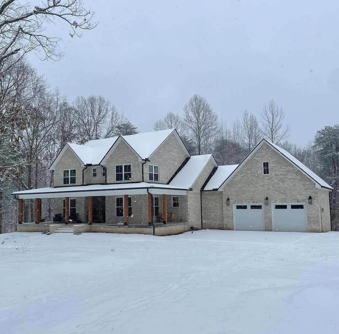 Light Stone Exterior Walls With Dark Trim